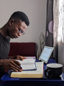 male student studying alone